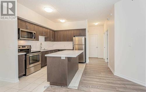 313 - 640 Sauve Street, Milton, ON - Indoor Photo Showing Kitchen