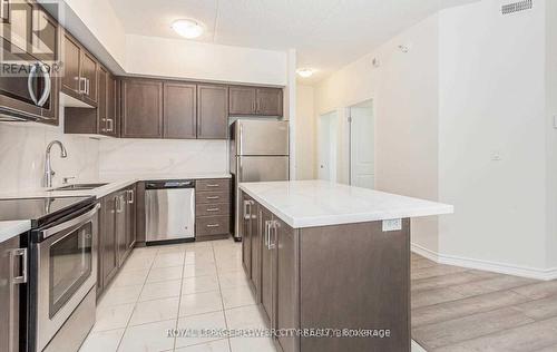 313 - 640 Sauve Street, Milton, ON - Indoor Photo Showing Kitchen