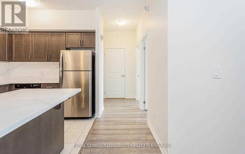 313 - 640 Sauve Street, Milton, ON - Indoor Photo Showing Kitchen