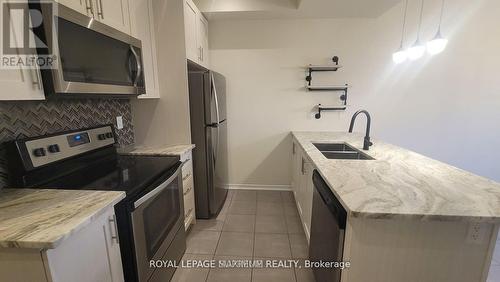 10 - 5056 Serena Drive, Lincoln, ON - Indoor Photo Showing Kitchen With Stainless Steel Kitchen With Double Sink With Upgraded Kitchen