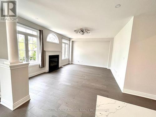 4 Castleglen Boulevard, Markham, ON - Indoor Photo Showing Living Room With Fireplace