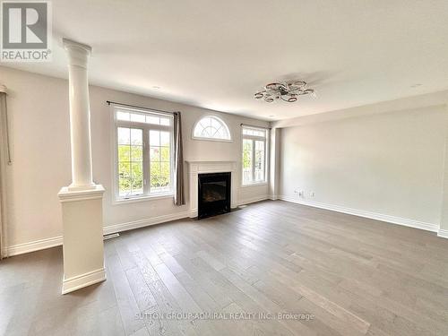 4 Castleglen Boulevard, Markham, ON - Indoor Photo Showing Living Room With Fireplace