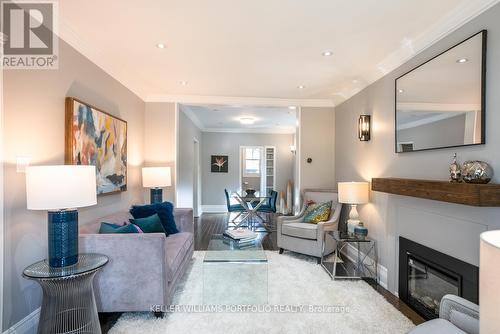 73 Hanna Road, Toronto, ON - Indoor Photo Showing Living Room With Fireplace