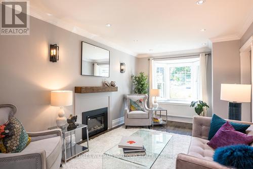 73 Hanna Road, Toronto, ON - Indoor Photo Showing Living Room With Fireplace