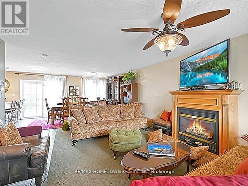 16 Regency Place, Brockville, ON - Indoor Photo Showing Living Room With Fireplace