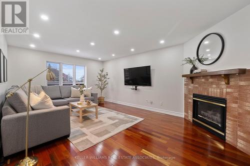 3543 Trelawny Circle, Mississauga, ON - Indoor Photo Showing Living Room With Fireplace