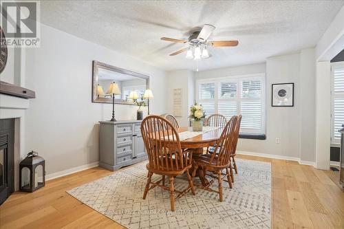 5160 Ridgewell Road E, Burlington, ON - Indoor Photo Showing Dining Room With Fireplace