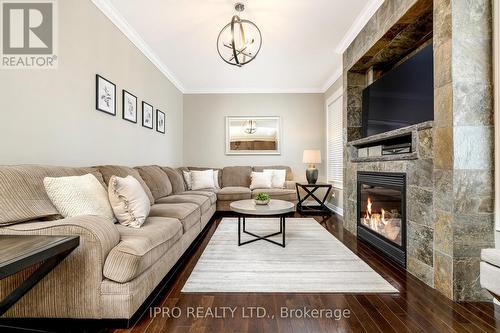 537 Grant Way, Milton, ON - Indoor Photo Showing Living Room With Fireplace