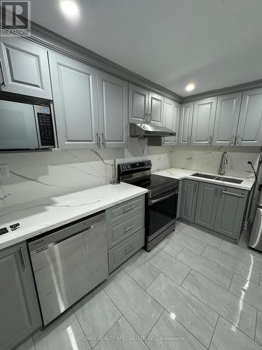 16 Maynada Road, Brampton, ON - Indoor Photo Showing Kitchen With Double Sink