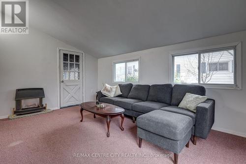 20 Second Street, Norfolk (Delhi), ON - Indoor Photo Showing Living Room With Fireplace