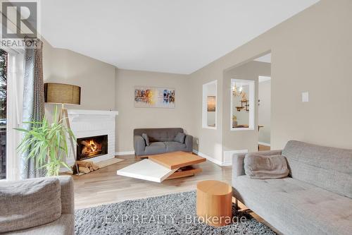 36 Greenboro Crescent, Ottawa, ON - Indoor Photo Showing Living Room With Fireplace