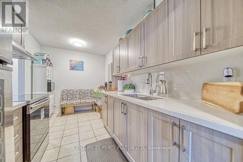 1109 - 1250 Bridletowne Circle, Toronto, ON - Indoor Photo Showing Kitchen With Double Sink