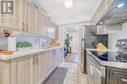 1109 - 1250 Bridletowne Circle, Toronto, ON - Indoor Photo Showing Kitchen