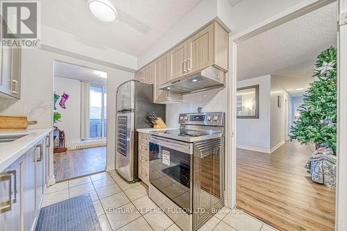 1109 - 1250 Bridletowne Circle, Toronto, ON - Indoor Photo Showing Kitchen