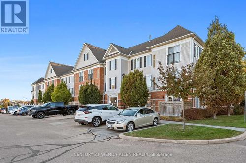 #309 - 98 Aspen Spring Drive, Clarington, ON - Outdoor With Facade