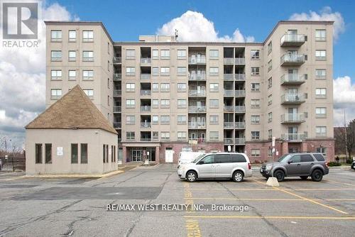 501 - 7405 Goreway Drive, Mississauga, ON - Outdoor With Balcony With Facade