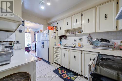 18 - 7475 Goreway Drive, Mississauga, ON - Indoor Photo Showing Kitchen With Double Sink