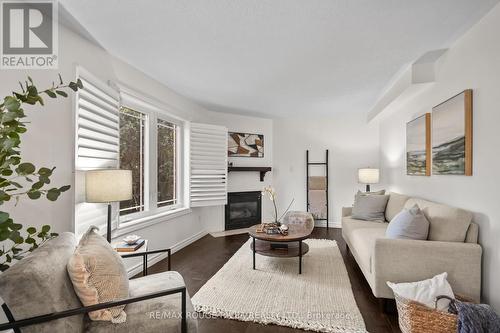 31 Kerrison Drive W, Ajax (Central), ON - Indoor Photo Showing Living Room With Fireplace