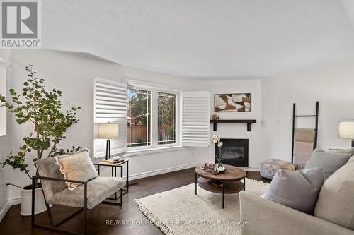 31 Kerrison Drive W, Ajax (Central), ON - Indoor Photo Showing Living Room With Fireplace