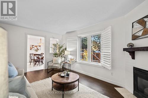 31 Kerrison Drive W, Ajax (Central), ON - Indoor Photo Showing Living Room With Fireplace