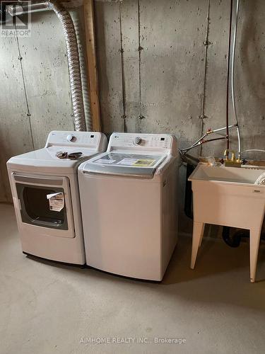 23 Hickling Lane, Ajax, ON - Indoor Photo Showing Laundry Room