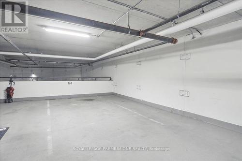 301 - 150 Wellington Street E, Guelph, ON - Indoor Photo Showing Garage