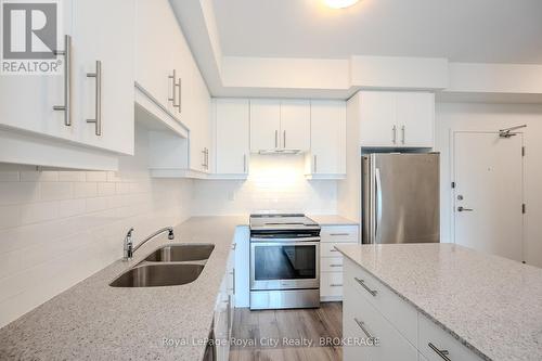 420 - 251 Northfield Drive E, Waterloo, ON - Indoor Photo Showing Kitchen With Double Sink With Upgraded Kitchen