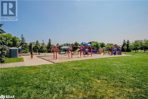 View of play area with a yard - 2300 Parkhaven Boulevard Unit# 103, Oakville, ON - Outdoor With View