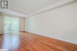 Spare room with light wood-type flooring - 