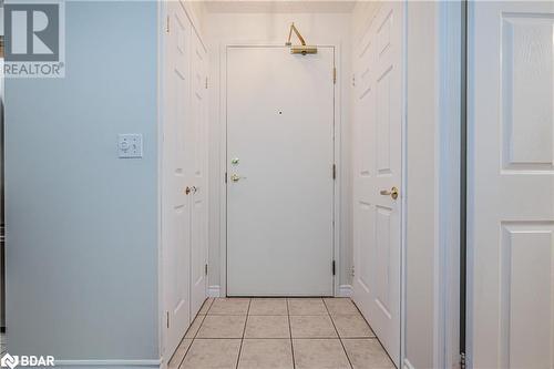 Entryway with light tile patterned floors - 2300 Parkhaven Boulevard Unit# 103, Oakville, ON - Indoor Photo Showing Other Room