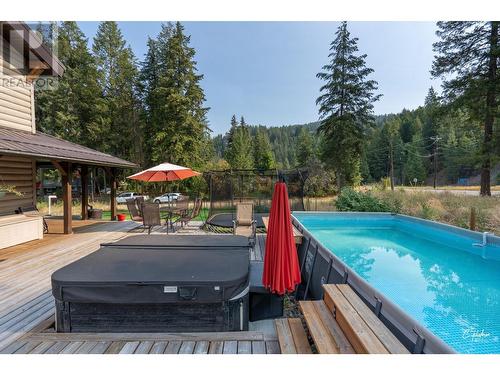 2111 Dunn Road, Christina Lake, BC - Outdoor With Above Ground Pool With Deck Patio Veranda