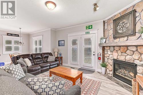 120 - 184 Snowbridge Way, Blue Mountains (Blue Mountain Resort Area), ON - Indoor Photo Showing Living Room With Fireplace