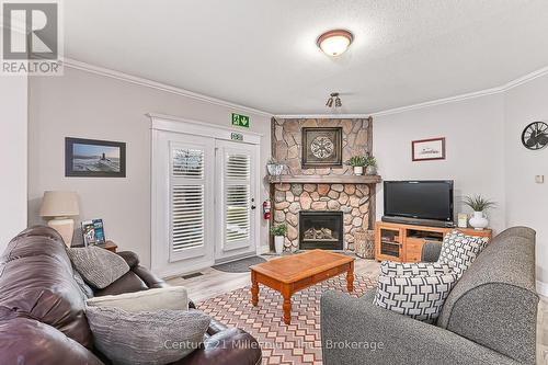 120 - 184 Snowbridge Way, Blue Mountains (Blue Mountain Resort Area), ON - Indoor Photo Showing Living Room With Fireplace