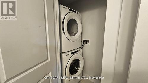 L107 - 9560 Islington Avenue W, Vaughan, ON - Indoor Photo Showing Laundry Room