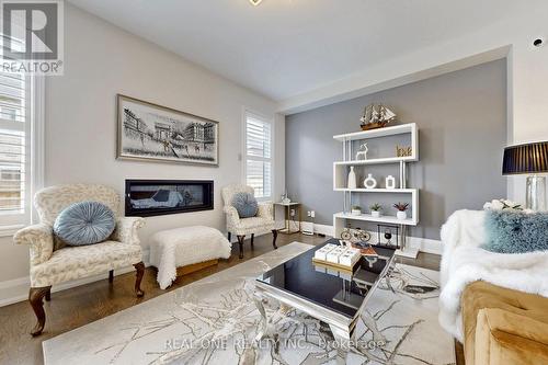 125 Joseph Hartman Crescent, Aurora, ON - Indoor Photo Showing Living Room With Fireplace