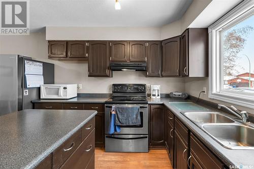 410 Nesbitt Way, Saskatoon, SK - Indoor Photo Showing Kitchen With Double Sink