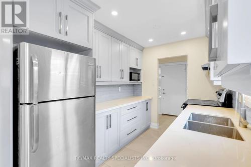 Main - 103 Manitou Crescent, Brampton, ON - Indoor Photo Showing Kitchen With Double Sink