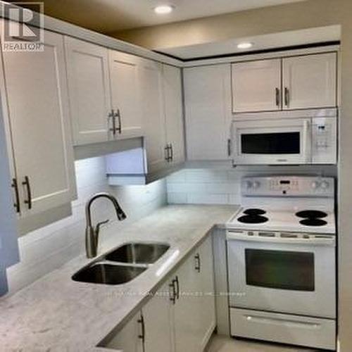 701 - 1225 North Shore Boulevard E, Burlington, ON - Indoor Photo Showing Kitchen With Double Sink