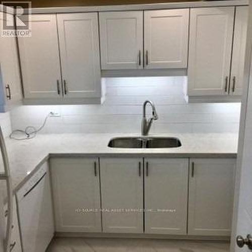 701 - 1225 North Shore Boulevard E, Burlington, ON - Indoor Photo Showing Kitchen With Double Sink