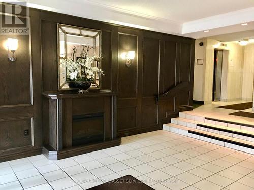 701 - 1225 North Shore Boulevard E, Burlington, ON - Indoor Photo Showing Other Room With Fireplace