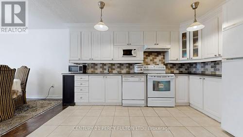 106 - 40 Panorama Court, Toronto, ON - Indoor Photo Showing Kitchen