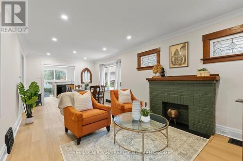 13 Linden Street, St. Catharines (451 - Downtown), ON - Indoor Photo Showing Living Room With Fireplace