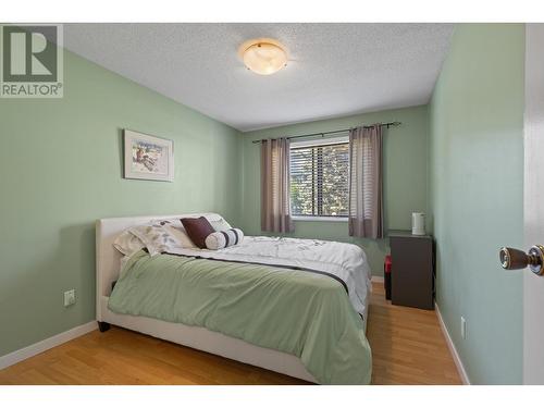 1035 Bernard Avenue Unit# 108, Kelowna, BC - Indoor Photo Showing Bedroom