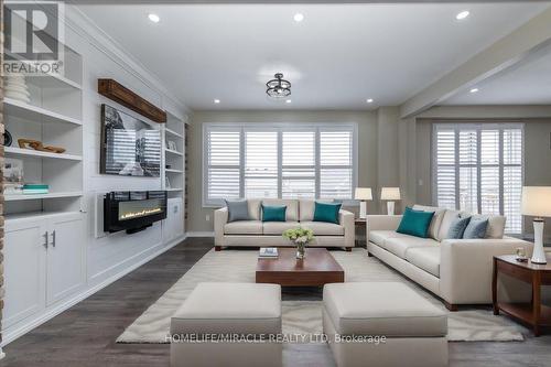 30 Michaelis Street, New Tecumseth, ON - Indoor Photo Showing Living Room With Fireplace