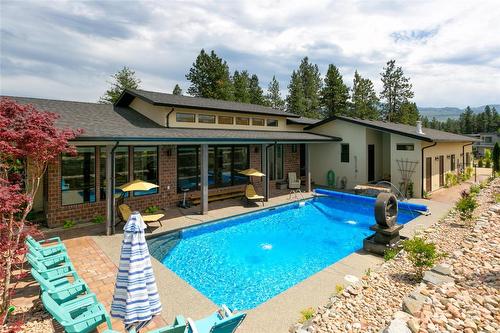 21-1150 Mission Ridge Road, Kelowna, BC - Outdoor With In Ground Pool With Deck Patio Veranda