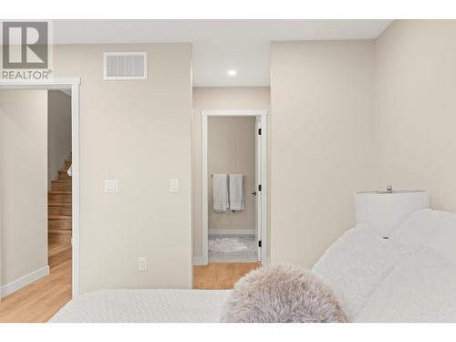 Primary Bedroom with Ensuite and Walk Thru Closet. - 3907 26 Street Unit# 2, Vernon, BC - Indoor Photo Showing Bedroom