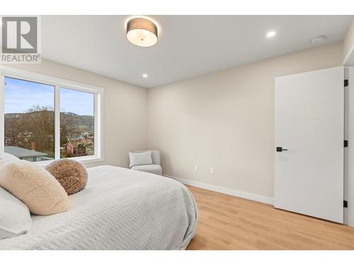 Primary Bedroom with Ensuite and Walk Thru Closet. - 3907 26 Street Unit# 2, Vernon, BC - Indoor Photo Showing Bedroom