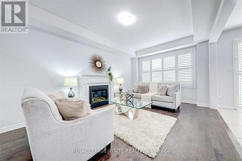 94 Elmhurst Street, Scugog, ON - Indoor Photo Showing Living Room With Fireplace