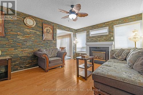 5415 Longford Drive, Mississauga, ON - Indoor Photo Showing Living Room With Fireplace