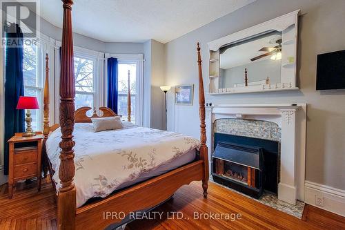 133 William Street, Brantford, ON - Indoor Photo Showing Bedroom With Fireplace